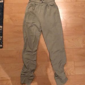 Green sweatpants